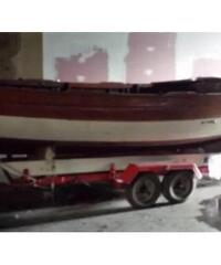 Barca a vela in legno con relativo carrello